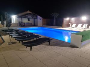 Villas villa spacieuse avec piscine, jacuzzi : photos des chambres