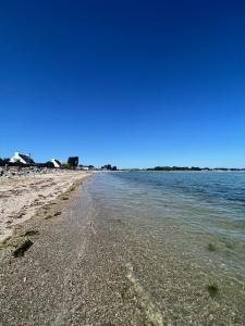 Maisons de vacances Maison pour 8 - 300m de la plage du Rouvran : photos des chambres