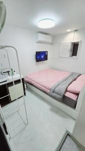 Phòng Giường Đôi Lớn Loại Sang (Deluxe Queen Room)