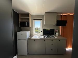 Le Laurier, mobil-home climatisé avec vue sur mer