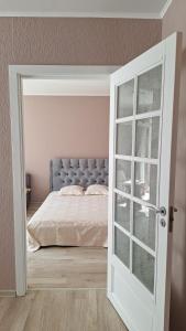 Apartamentai su balkonu