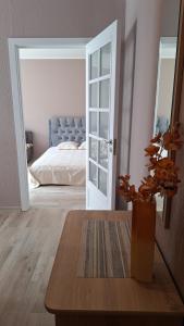 Apartamentai su balkonu