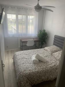 Appartements Appartement entier climatise - parking prive : photos des chambres