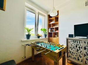 Apartament z widokiem na Pałac i Kościół.