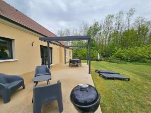 Maisons de vacances Aux charmes de la campagne : photos des chambres