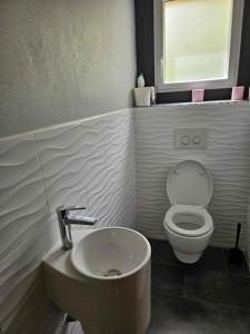 Maisons de vacances Aux charmes de la campagne : photos des chambres