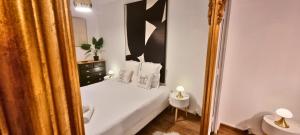 Appartements Au Palais des Pyrenees! Hyper centre -Clim-Balcon-Parking Gratuit : photos des chambres