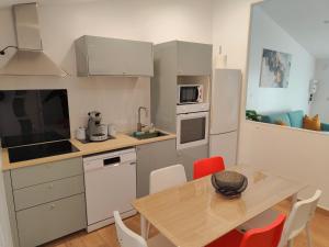 Appartements Bel appartement avec piscine : photos des chambres