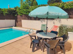 Appartements Bel appartement avec piscine : photos des chambres