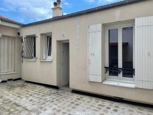 Appartements VANVES studio calme rez-de-chaussee cour Porte de Versailles : photos des chambres