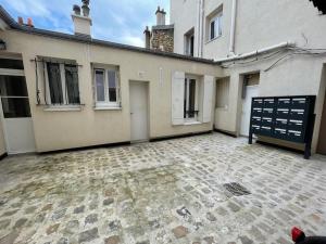 Appartements VANVES studio calme rez-de-chaussee cour Porte de Versailles : photos des chambres