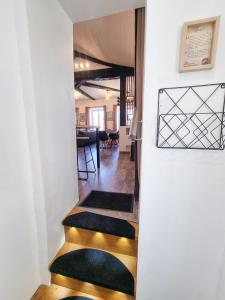 Appartements Duplex Le Chai de l-Abreuvoir : photos des chambres