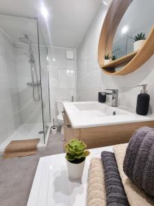 Appartements Duplex Le Chai de l-Abreuvoir : photos des chambres