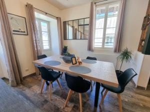 Appartements Duplex Le Chai de l-Abreuvoir : photos des chambres