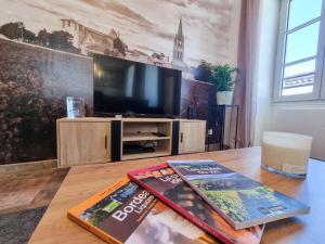 Appartements Duplex Le Chai de l-Abreuvoir : photos des chambres