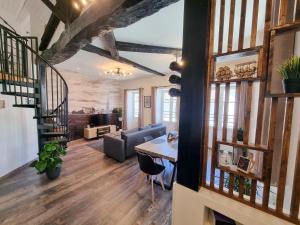 Appartements Duplex Le Chai de l-Abreuvoir : photos des chambres