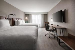 Queen Room with Two Queen Beds room in Four Points by Sheraton - San Francisco Airport