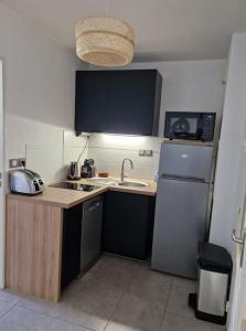 Le Grand Large T2 climatisé à 200 m plage, parking