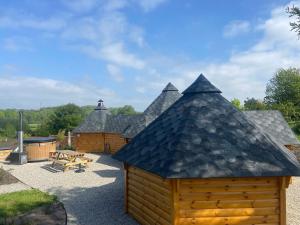 Maison bois kota bain nordique proche de la mer kota grill