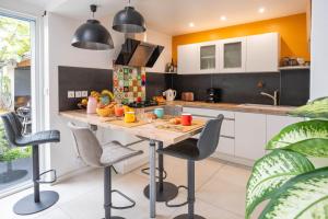 Villas Les Arenes Wi-Fi Climatisation Jardin Netflix 10 mn coeur de ville : photos des chambres