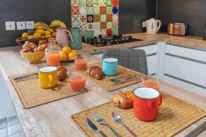Villas Les Arenes Wi-Fi Climatisation Jardin Netflix 10 mn coeur de ville : photos des chambres