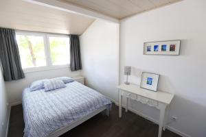 Villas Le bonheur les pieds dans l-eau : photos des chambres