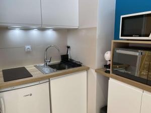 Appartements ARGUIN studio cabine renove coeur de ville : photos des chambres