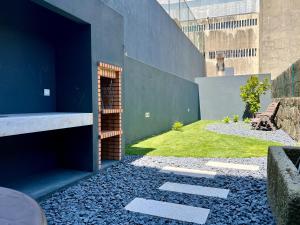 Light-Filled Apartment with Garden • Downtown