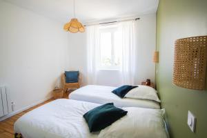 Appartements -LE SENTIER- Elegant T3 avec jardin proche mer : photos des chambres