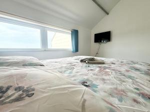 Appartements L'Opaline - Vue mer : photos des chambres