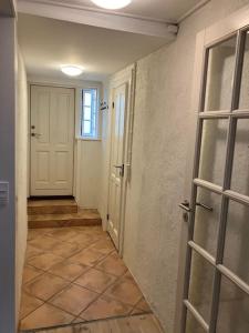 Charmerende byhus midt i Assens