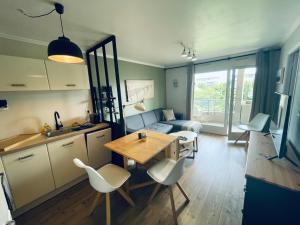 Appartements La Mesange, vue montagnes a deux pas du lac : photos des chambres