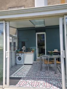 Appart rez-de-jardin proche gare