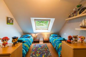 Maisons de vacances Chez Papitou - Escapade Familiale en Bretagne : photos des chambres