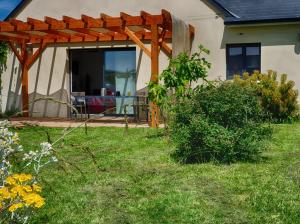Maisons de vacances Le Logis d'Emeric avec paisible jardin Clos&Arbore : photos des chambres