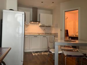 Appartements Un nido a Versailles : photos des chambres