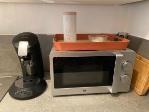 Appartements Chambre tout confort avec commodites espace repas wifi parking : photos des chambres