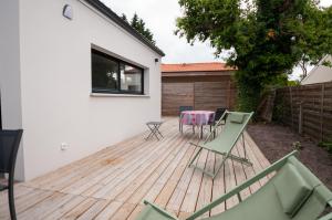 Maisons de vacances Maison St Brice Terrasse lits en 160 Confortable : photos des chambres