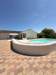 Maisons de vacances Maison chaleureuse avec piscine : photos des chambres