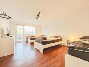 Home4Now BM02 Monteursunterkunft in Bergheim I 2 Schlafzimmer für 5 Personen I Küche I SmartTV I WiFi I Parkplatz