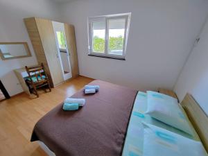 Apartments with parking space Barbat, Rab - 22752