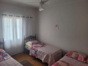 304 Tupi Vista Mar II - TUPI - 15 metros da praia - 2 dormitórios - WI FI e acomoda até 8 pessoas - Estacionamento Gratuito ap.304