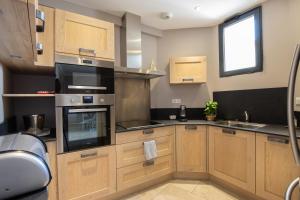 Appartements Au coeur de l-Isle : photos des chambres