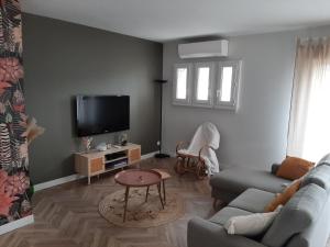 Appartements Appartement Magnolia : photos des chambres