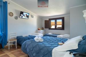 Deluxe Quadruple Room room in Il Marchese
