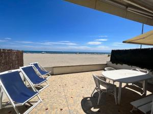 Maisons de vacances Maison sur la plage front de mer : photos des chambres