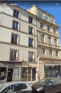 Appartements Un nido a Versailles : photos des chambres