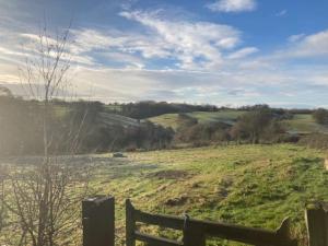 A charming unique lodge, with log burner and incredible views