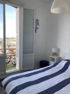 Appartements Appartement cosy vue mer : photos des chambres