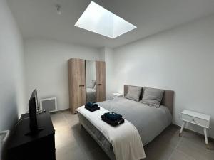 Appartements Duplex Neuf et Cosy avec Place Parking : photos des chambres